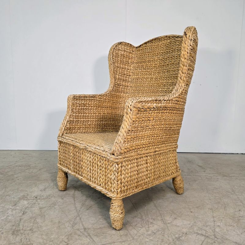 Large wingback armchair woven from seagrass
