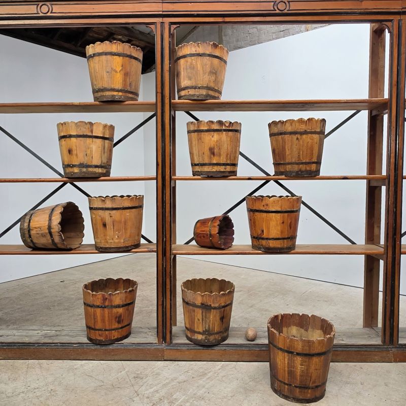 Set of 12 iron and wooden pot covers