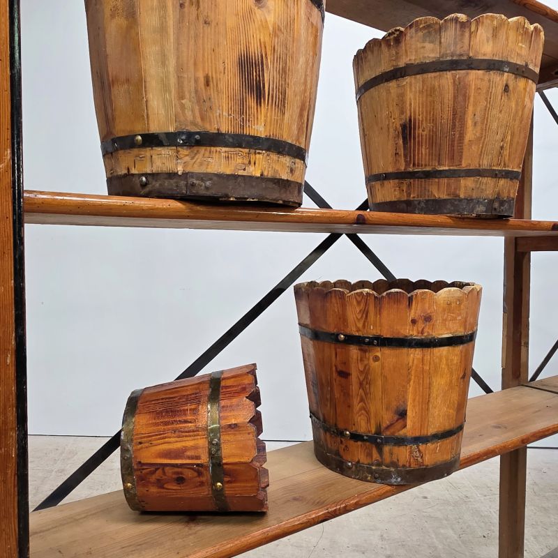 Set of 12 iron and wooden pot covers. Alternate view