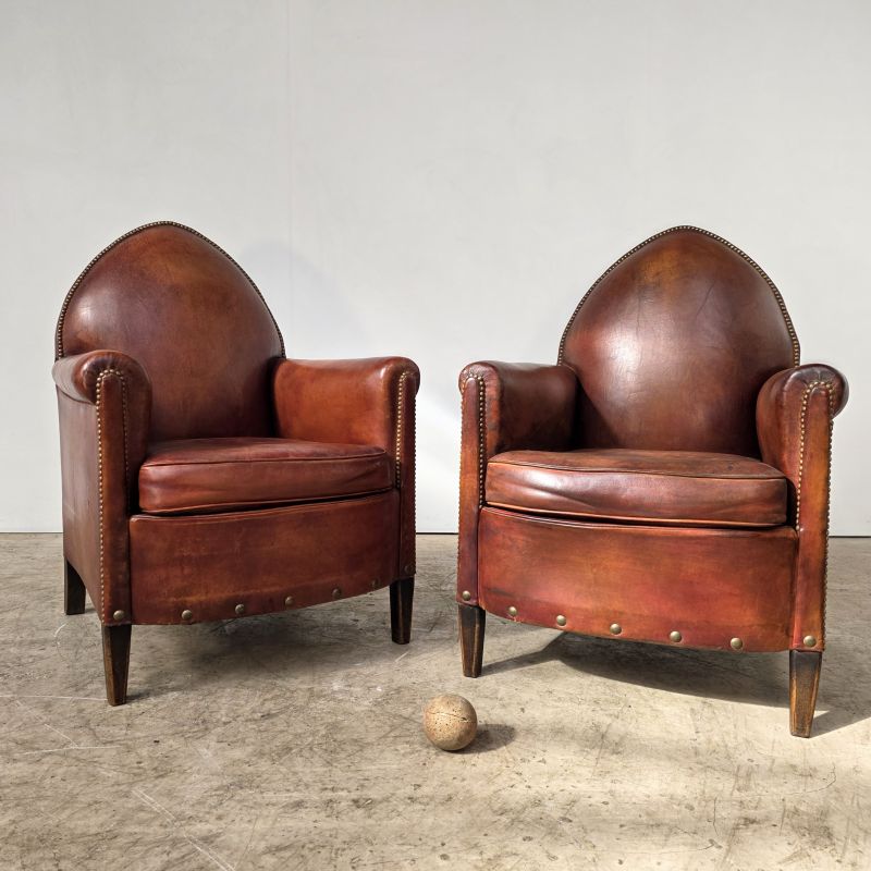 Nice pair of early 20th-century Gothic-style leather armchairs.