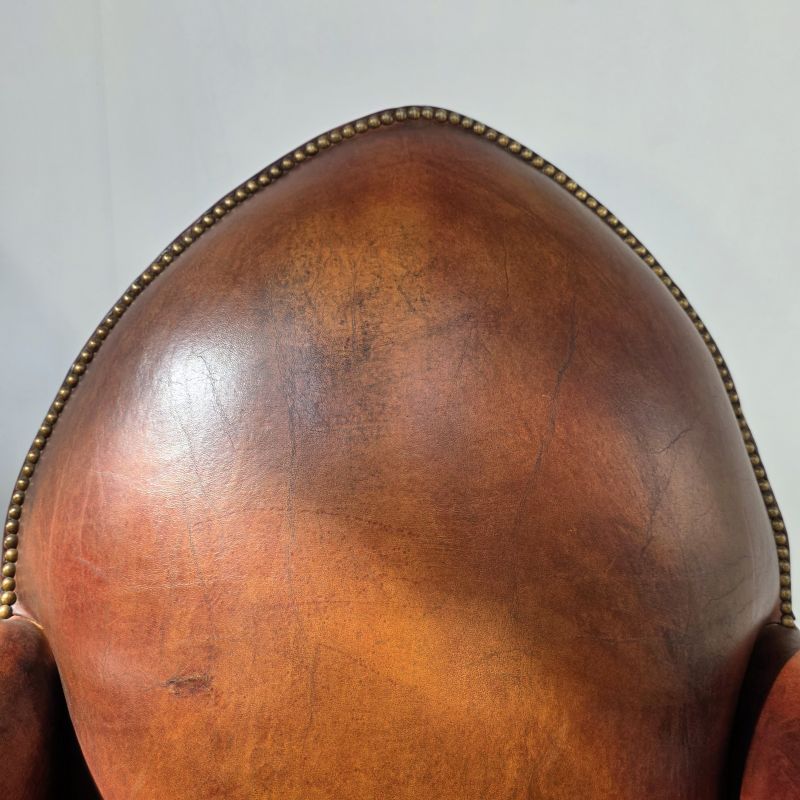 Nice pair of early 20th-century Gothic-style leather armchairs.. Alternate view