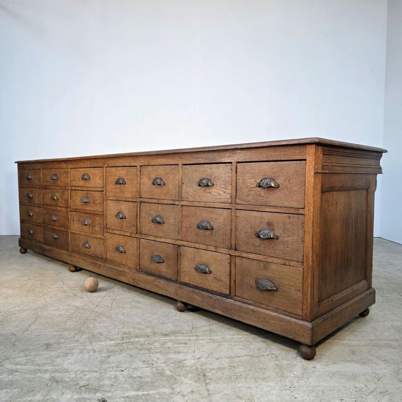 Large 19th-century oak shop counter with 24 drawers from parisian old hardware store. Alternate view